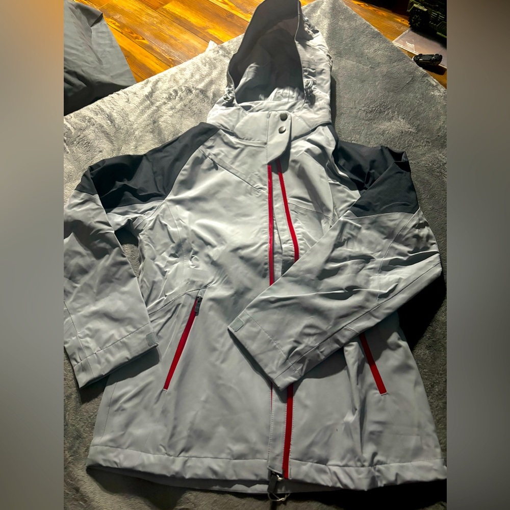 Brand New Grey with dark grey sleeves and red zipper